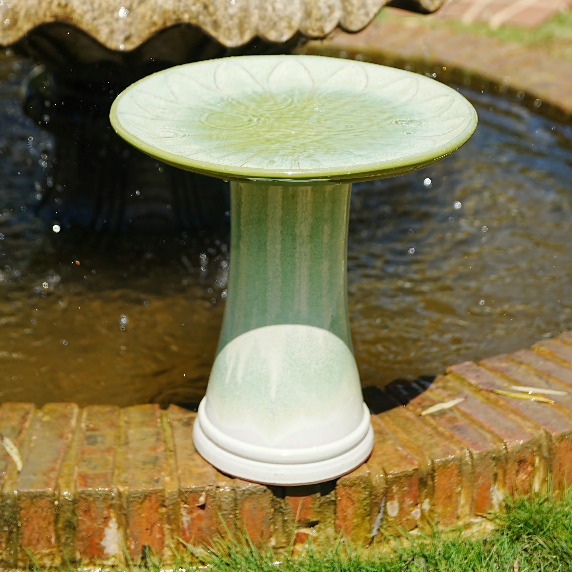 Handmade glazed ceramic bird bath, 17" daisy petal embossed tray & 18" pedestal base, off-white to sage green ombre gradient glaze outdoor bird feeder for yard, lawn, patio & backyard